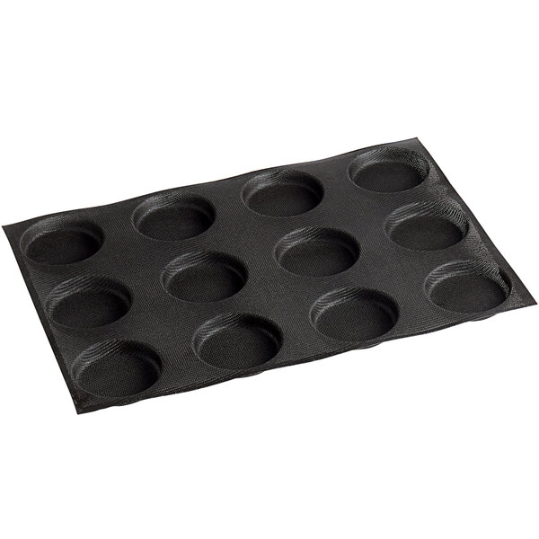 A black silicone bread mold with 12 compartments.