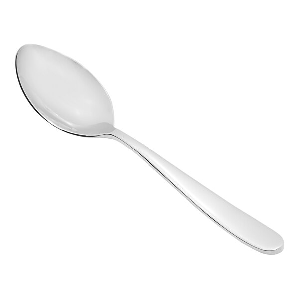 A close-up of a Fortessa Grand City stainless steel serving spoon with a silver handle on a white background.