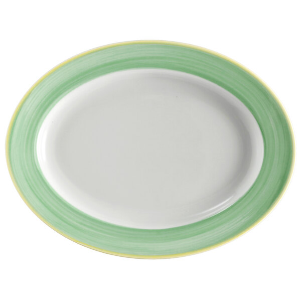 A white oval platter with a wide green and yellow rim.