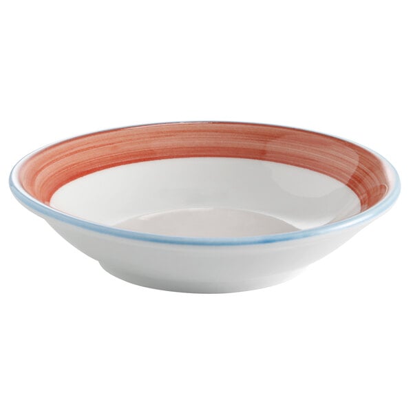 A bright white porcelain bowl with a red and blue rim.