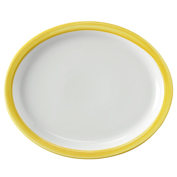 A white porcelain oval platter with a narrow yellow and coral rim.