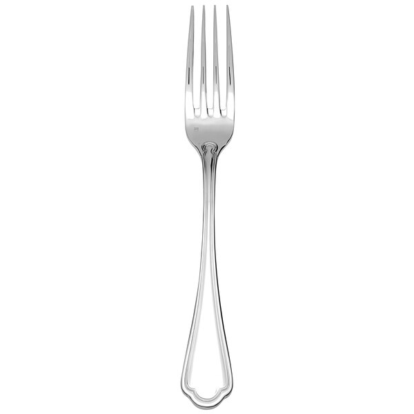A Fortessa Medici stainless steel dinner fork with a white handle.