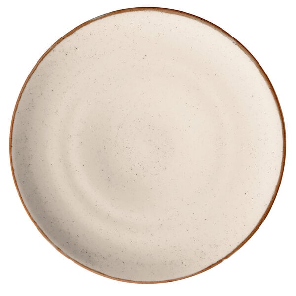 A beige porcelain coupe plate with a brown rim.