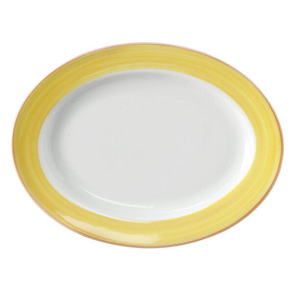 A white porcelain oval platter with a yellow and white rim.