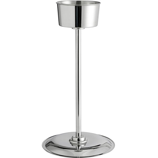 A Libbey stainless steel wine bucket stand on a table.