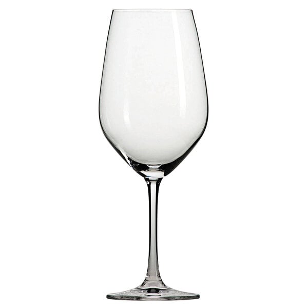 A close-up of a clear Schott Zwiesel wine glass with a stem.