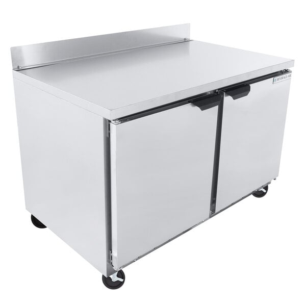 A large stainless steel Beverage-Air worktop refrigerator / freezer on wheels.