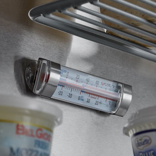 A Taylor refrigerator / freezer thermometer on a refrigerator.