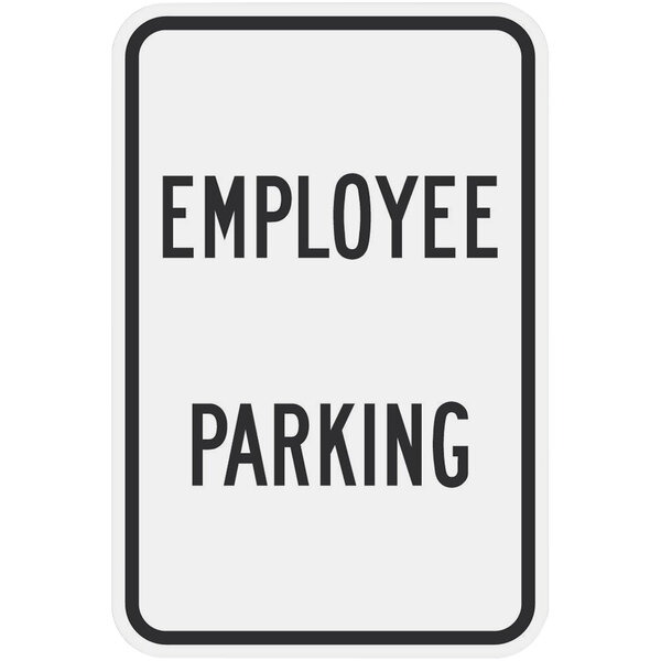 A white rectangular sign with black text reading "Employee Parking" and a diamond grade border.