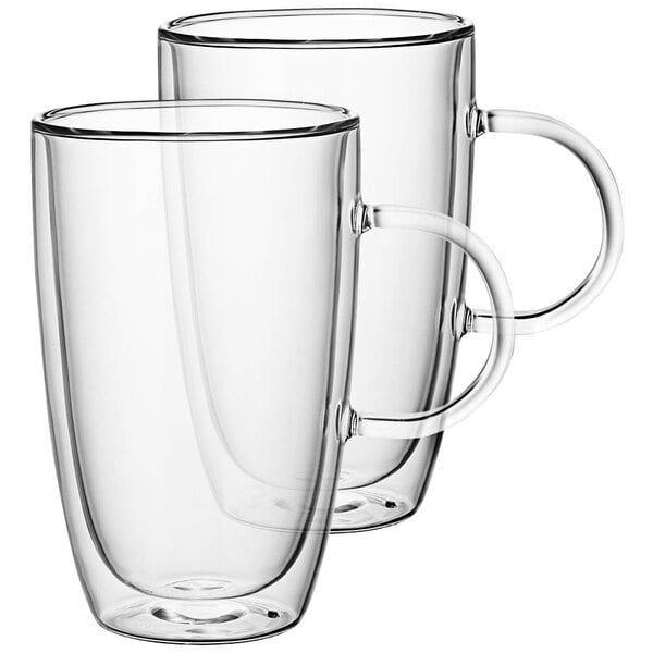 Two clear glass Villeroy & Boch Artesano barista cups with handles.
