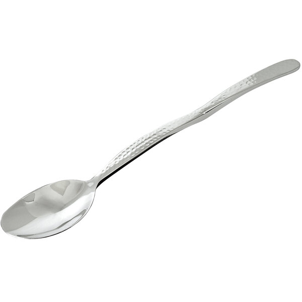 A solid stainless steel serving spoon with a hammered finish and a long handle.