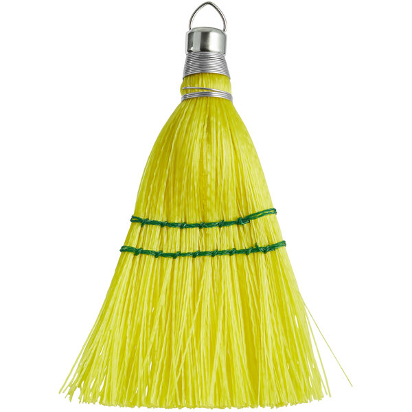 A yellow Carlisle 2-Stitch synthetic corn whisk broom with green trim.