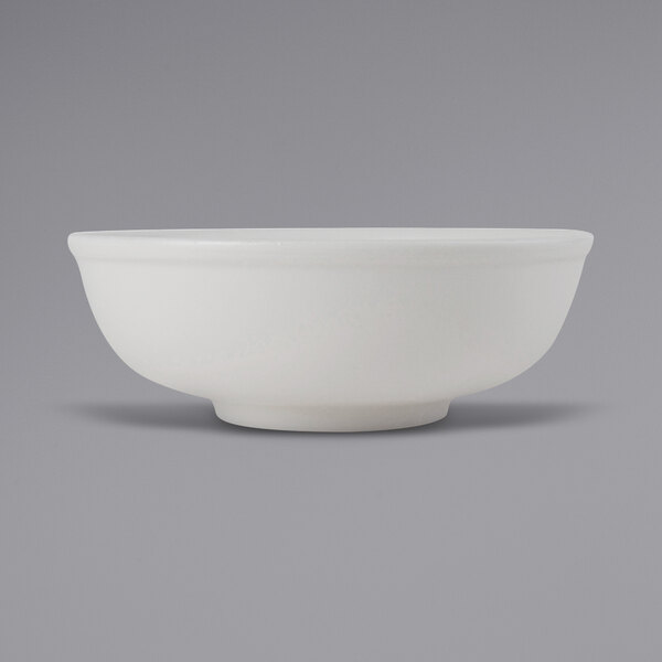 A Tuxton TuxTrendz Zion matte white china menudo bowl.