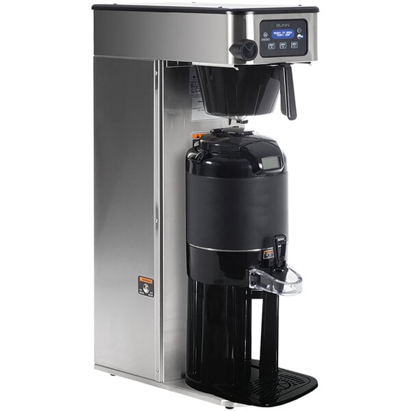 A Bunn stainless steel automatic coffee brewer with black containers on top.