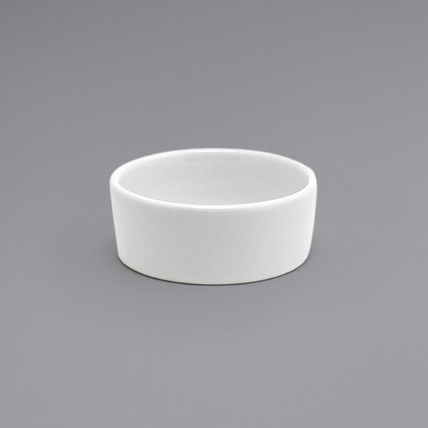 A Front of the House Soho bright white round porcelain ramekin.