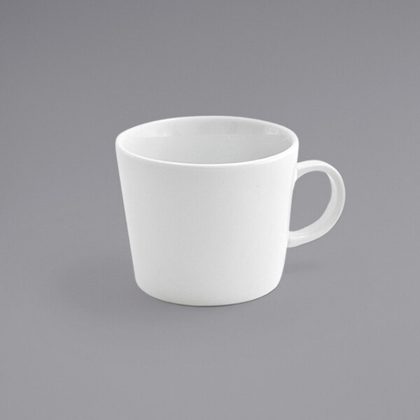 A Front of the House Soho bright white porcelain cup with a handle.