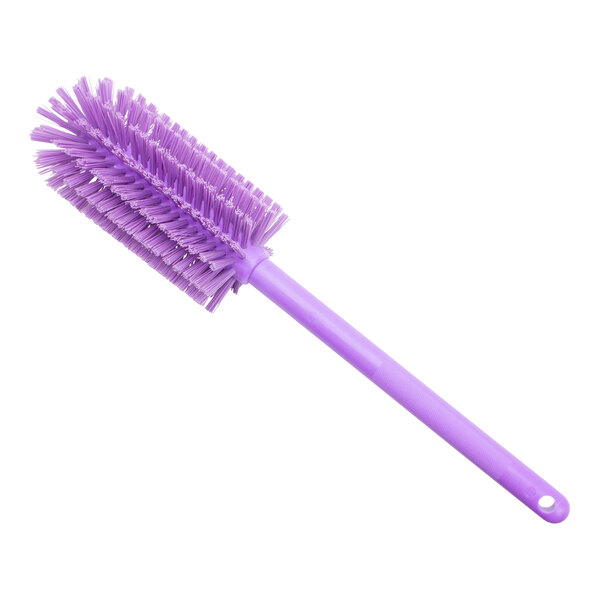 A Carlisle purple bottle cleaning brush with a long handle and long bristles.