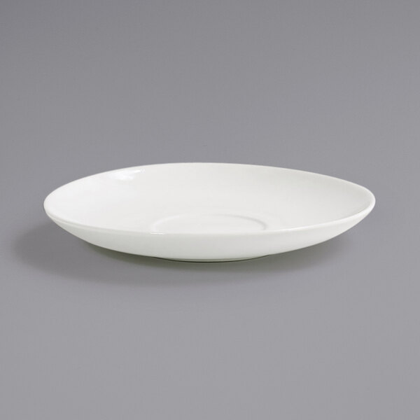 A white plate with a saucer on it.