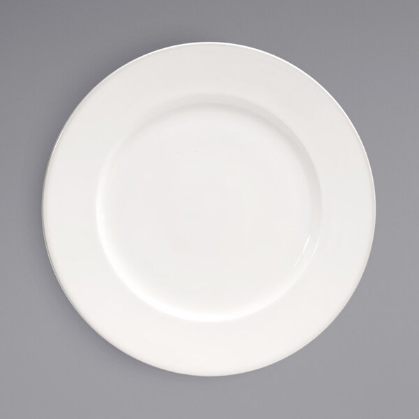 A white Front of the House porcelain plate with a wide, circular rim.
