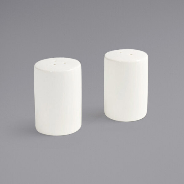 Two white Front of the House European white porcelain salt and pepper shakers with a black top.