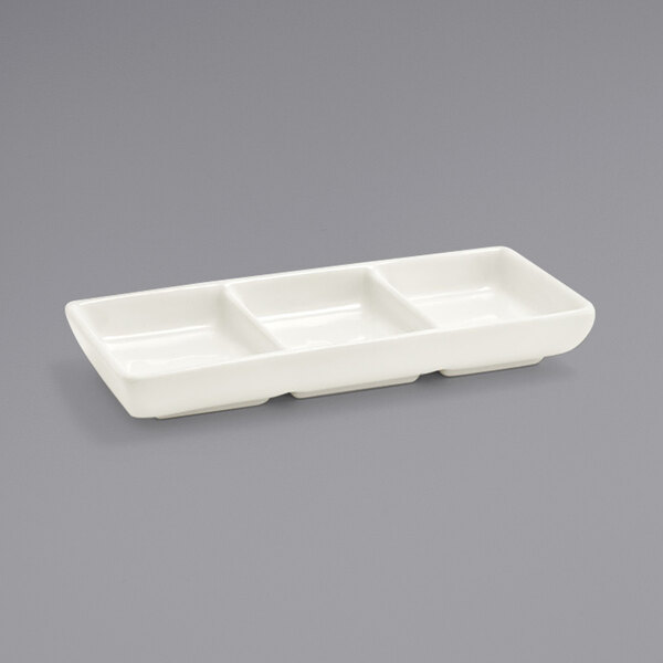 A white rectangular Front of the House Catalyst porcelain dish with three compartments.