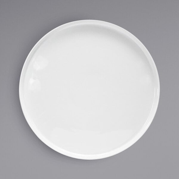 A white Front of the House Soho porcelain plate with a raised white rim.