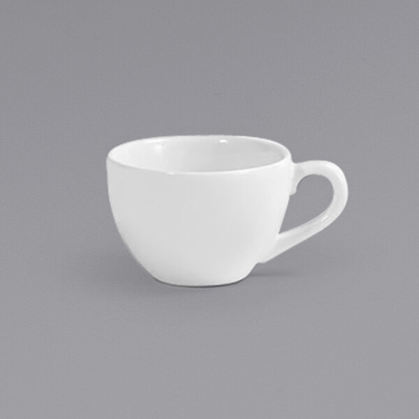 A Front of the House European white porcelain cup with a handle on a white surface.