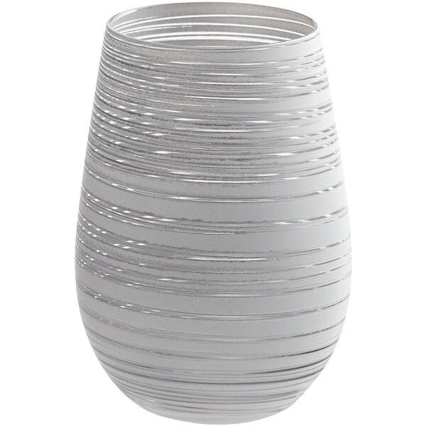 A white stemless wine glass with a silver spiral pattern.