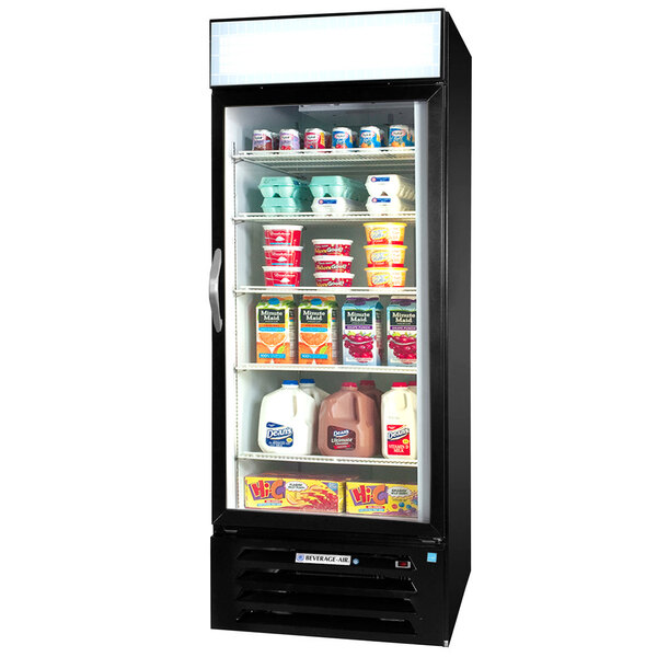 A Beverage-Air black glass door merchandiser full of dairy products.