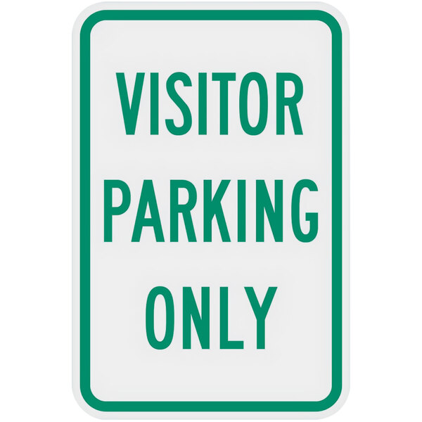 A white and green sign with green text reading "Visitor Parking Only" on a white background.