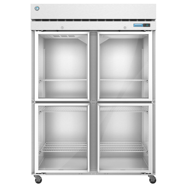 A white Hoshizaki reach-in freezer with half glass doors.