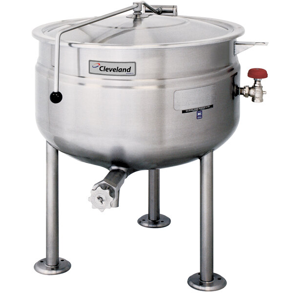 A Cleveland 125 gallon stainless steel steam kettle on a stand with a red valve.