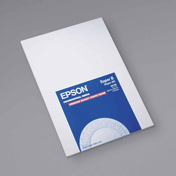 A white package with a blue and white label for Epson 13" x 19" Premium Photo Paper.