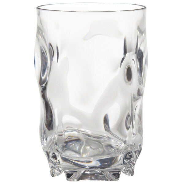 A clear plastic highball glass with a curved edge.