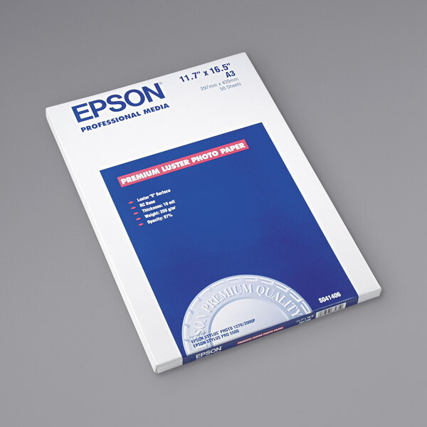A pack of white Epson Ultra Premium Photo Paper with blue text.