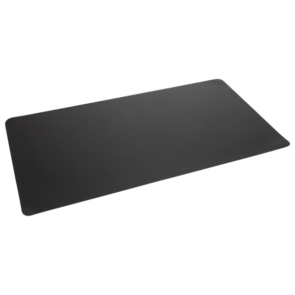 An Artistic Rhinolin II desk pad with black edges on a table.