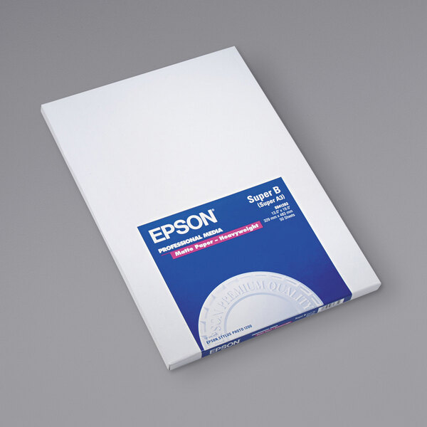 A white box of Epson Bright White Matte Presentation Paper with blue and white text.