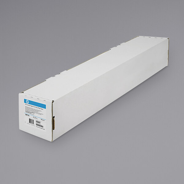 A long white box with a blue label containing HP glossy white roll paper.