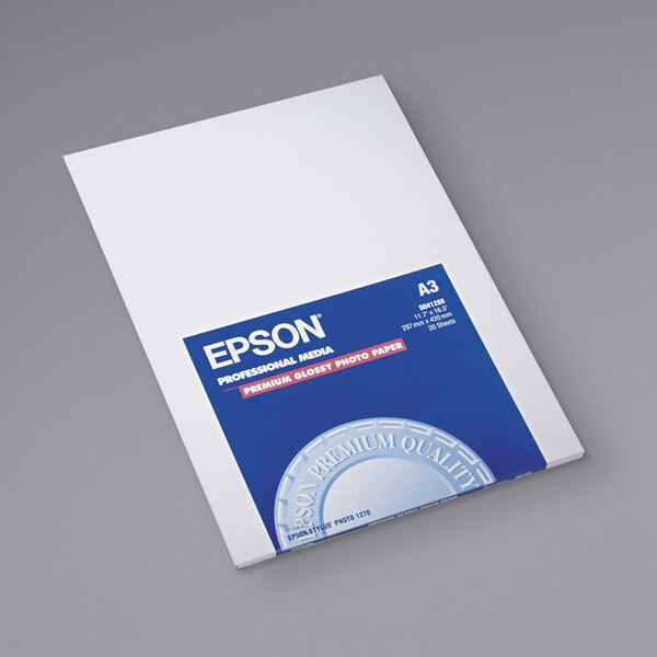 A white package of Epson photo paper with a blue and white label.