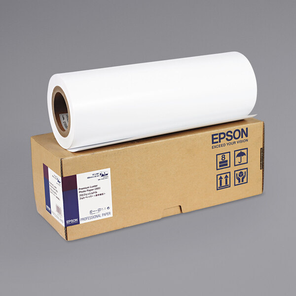 A white roll of Epson Premium Photo Paper on top of a brown box.