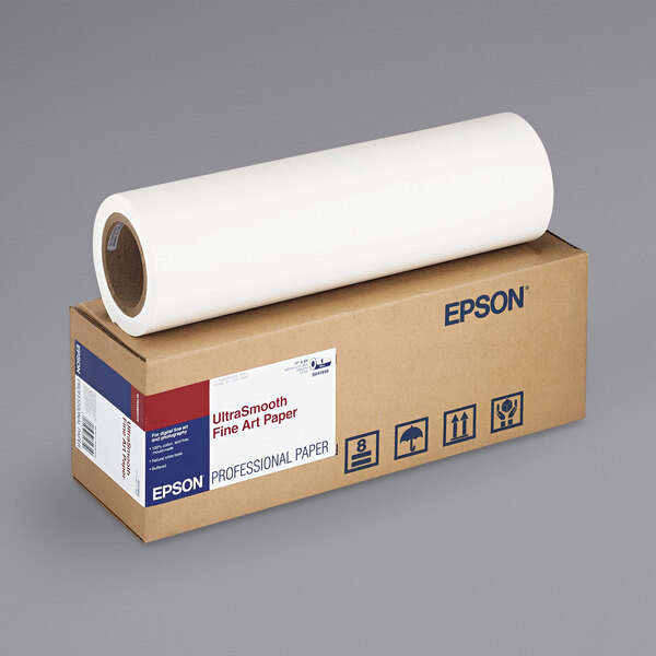 A roll of Epson UltraSmooth white fine art matte paper on a box.