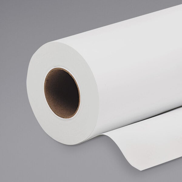 A roll of HP Inc. glossy white paper.