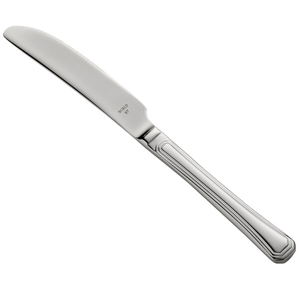 A Libbey High Society dessert knife with a silver handle.