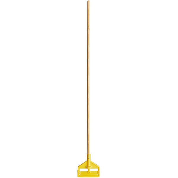 A close-up of a Rubbermaid wooden mop handle with a yellow side gate.