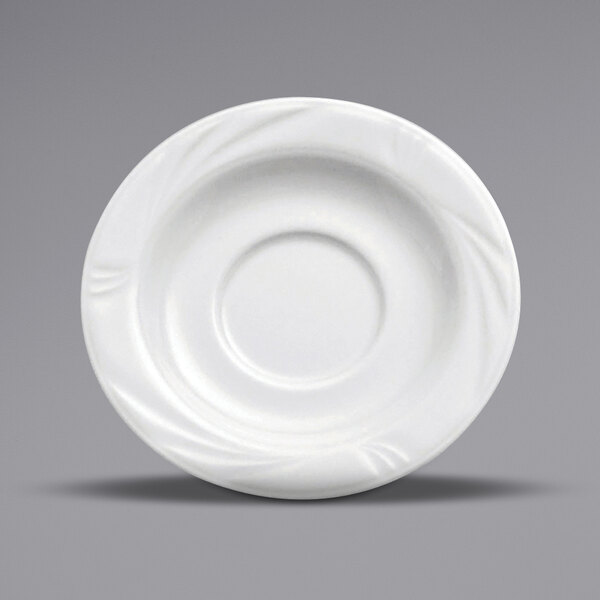 A white Oneida Buffalo Arcadia porcelain saucer with an embossed circular design.