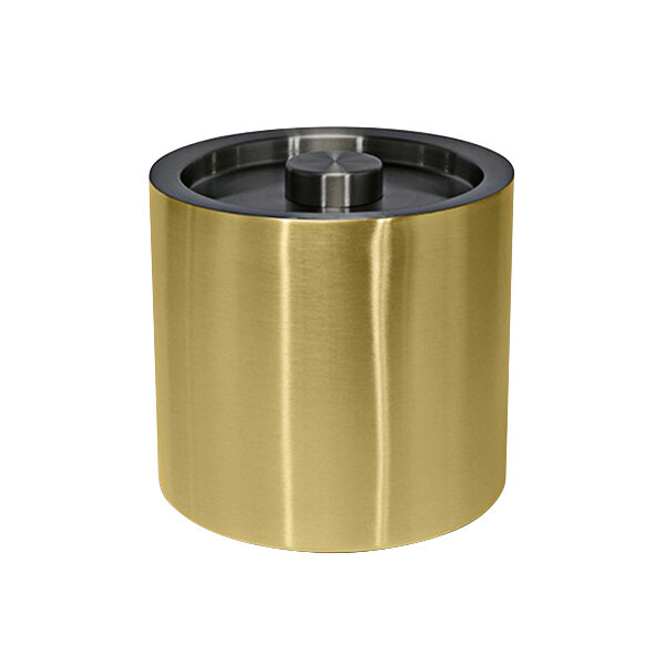 A gold metal cylinder with a matte black lid.