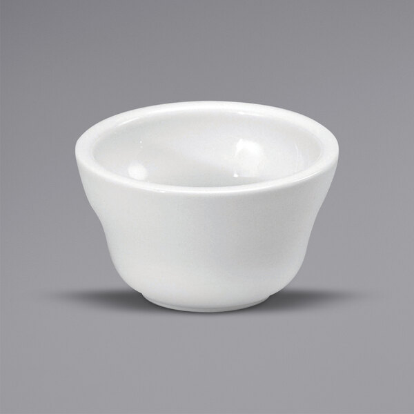 A close-up of a white Oneida Buffalo porcelain bouillon cup.