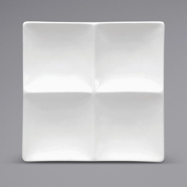 An Oneida Buffalo Bright White Ware square porcelain platter with four compartments.