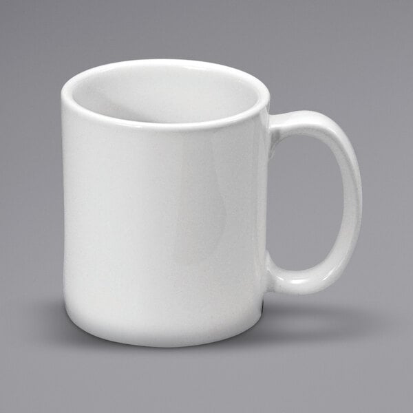 A white porcelain mug with a C-handle.