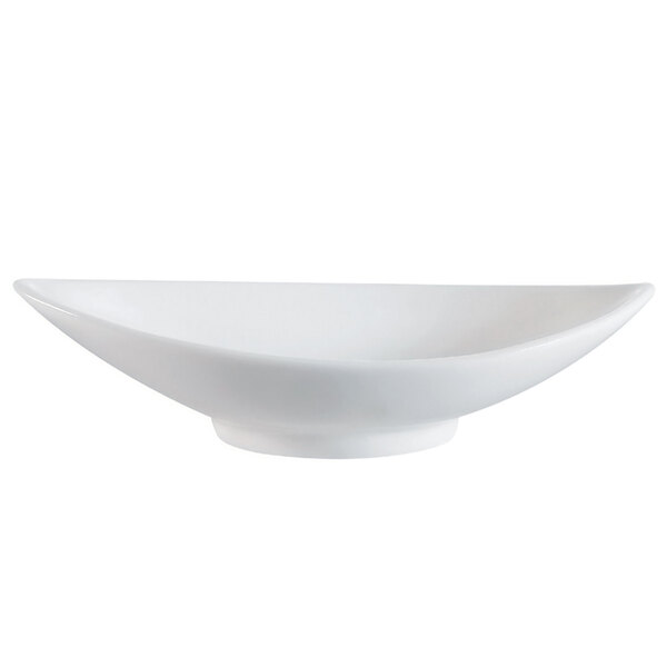 A CAC bone white porcelain canoe dish with a curved edge.